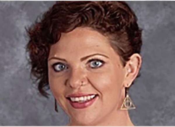 A PE teacher in Arkansas is accused of befriending a teen during a basketball game before sexually assaulting him in her office.