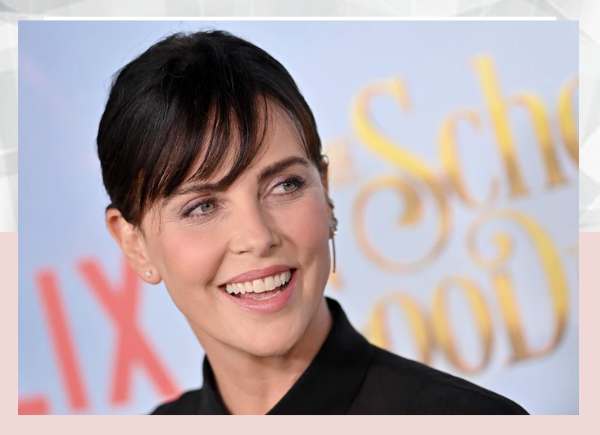Critics are furious with Charlize Theron for disparaging her native Afrikaans as a dying tongue.