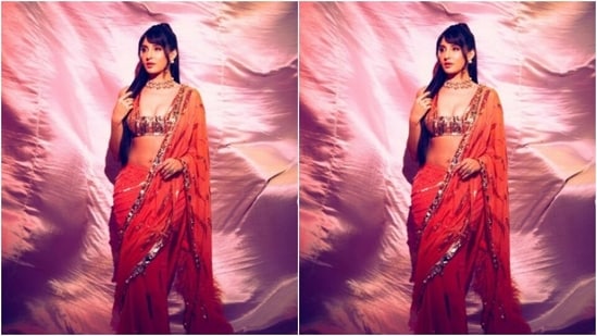Nora Fatehi, in a sequined saree, is a total smokeshow